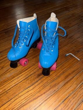 Bright Blue Classic Quad Roller Skates with Pink Wheels